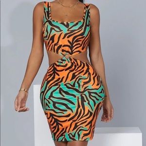 Multi Print O-Ring Bodycon Dress. Never worn. Size L.